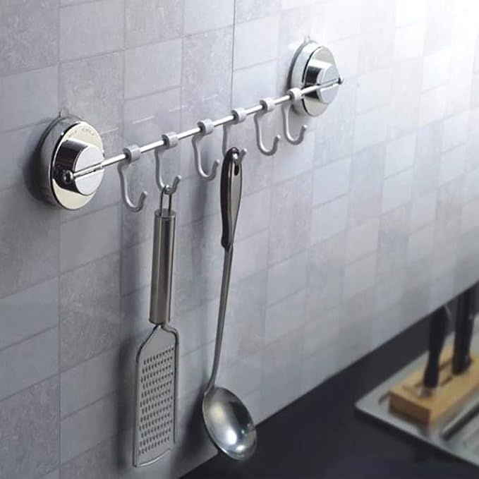 WALL MOUNTED HOLDER